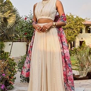 Crepe Ivory Top and Skirt with Gold Scalloped details.